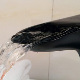 Contemporary Style Orb Single Handle One Hole Hot And Cold Water Bathroom Sink Faucet - Black