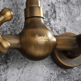 Antique Inspired Bathroom Sink Faucet - Wall Mount (Antique Brass Finish)